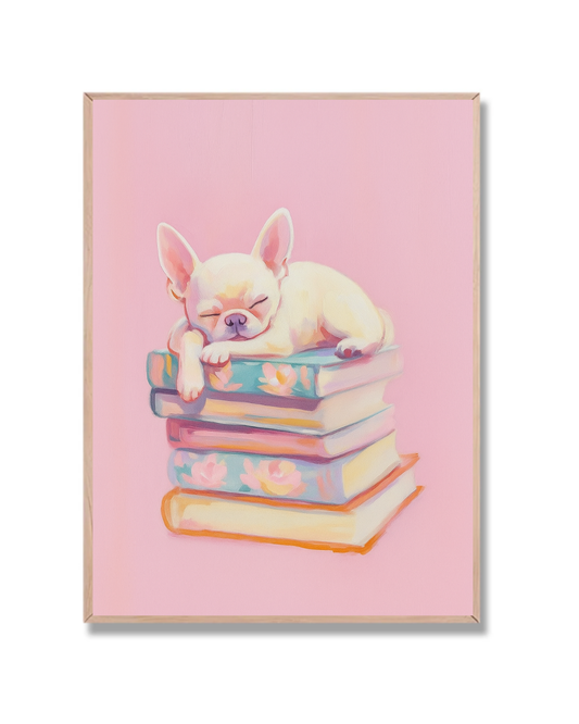 Perrito dormido sobre libros